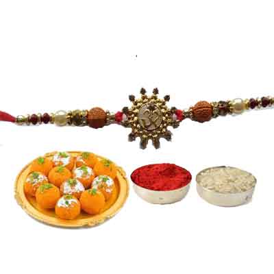 Beautiful Om Rakhi For Brother With Laddo