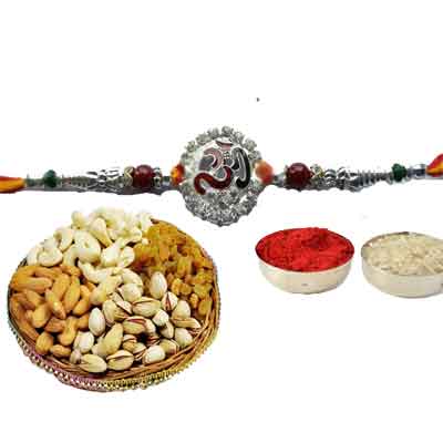 Silver Om Rakhi With Mix Dry Fruits Silver Om Rakhi With Mix Dry Fruits
